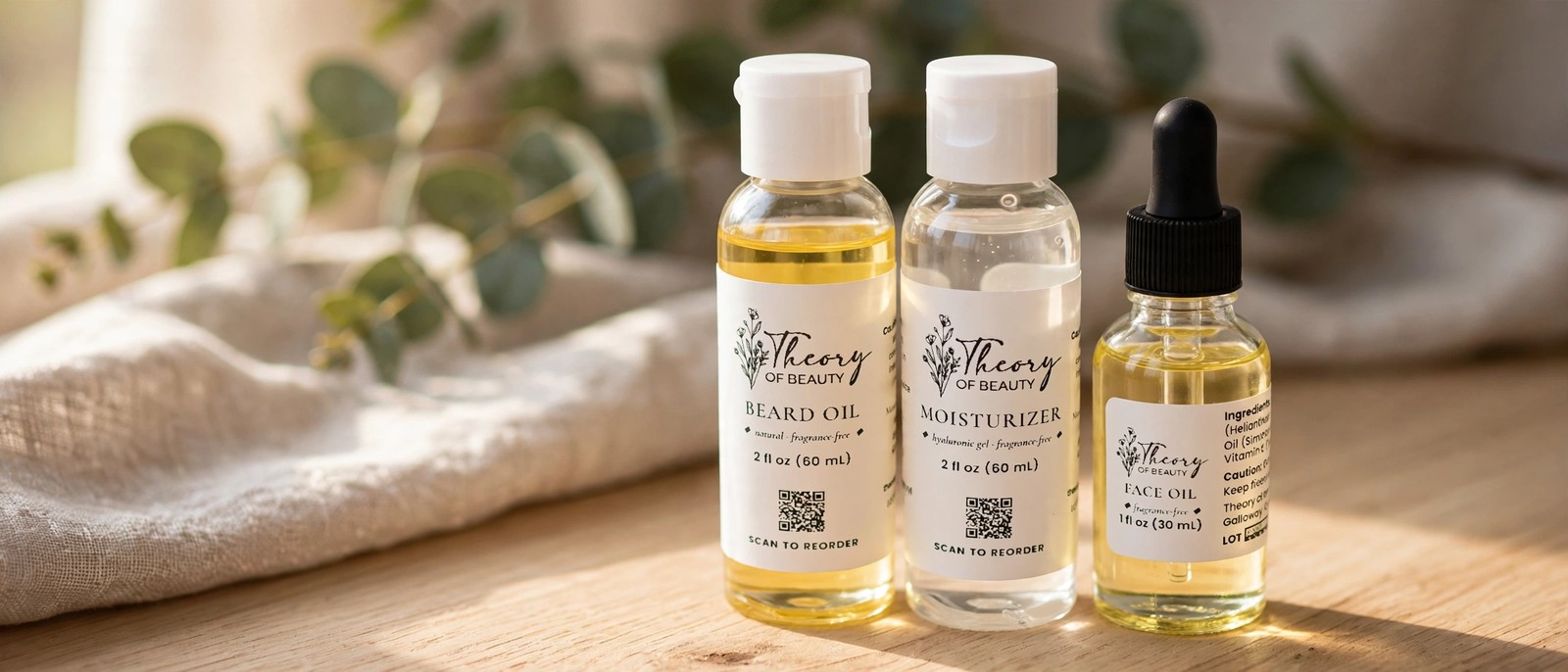 Theory of Beauty Unscented Beard Oil, Hyaluronic Gel Moisturizer and Unscented Face Oil on a wooden table